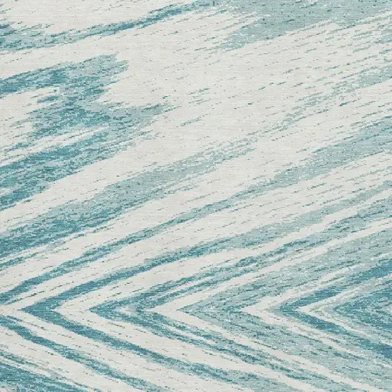 Teal And Ivory Abstract Washable Area Rug With UV Protection Photo 3