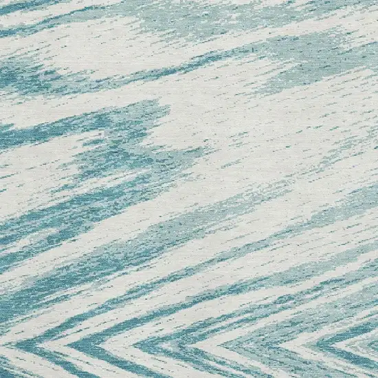 Teal And Ivory Abstract Washable Area Rug With UV Protection Photo 3