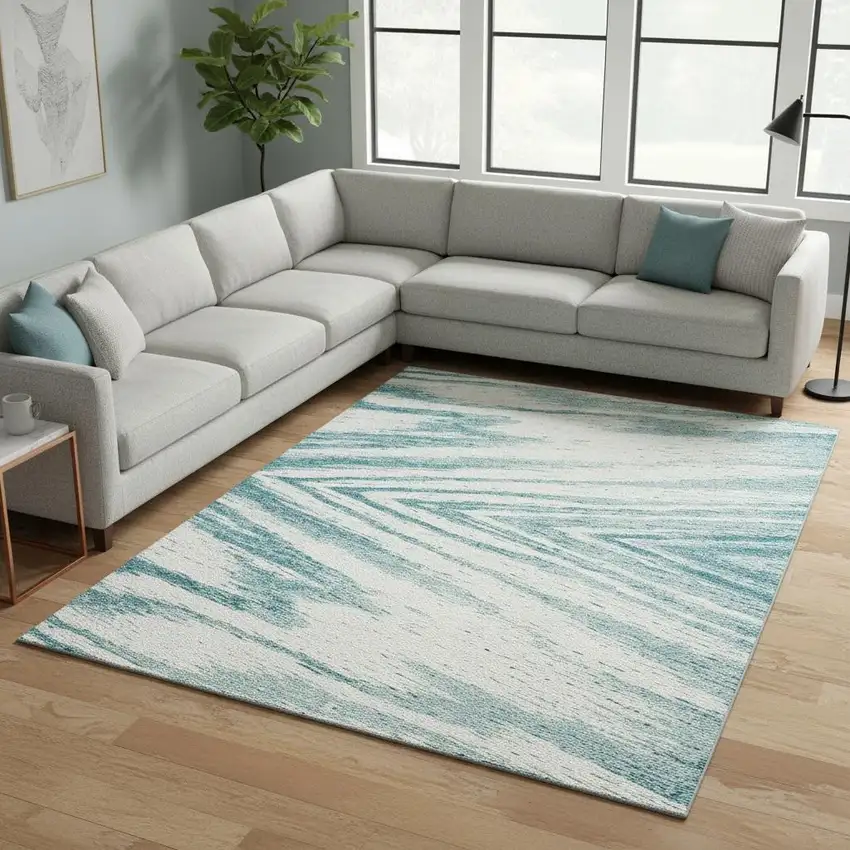 Teal And Ivory Abstract Washable Area Rug With UV Protection Photo 2