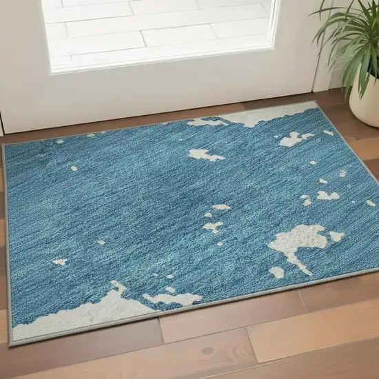 Teal And Ivory Abstract Washable Area Rug With UV Protection Photo 2
