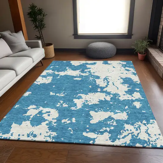 Teal And Ivory Abstract Washable Area Rug With UV Protection Photo 6
