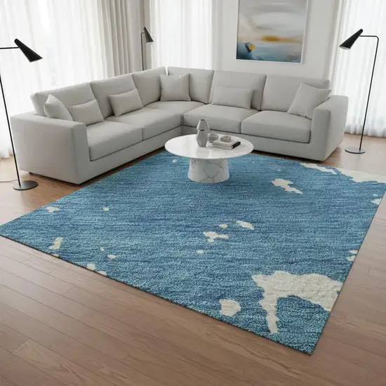 Teal And Ivory Abstract Washable Area Rug With UV Protection Photo 2