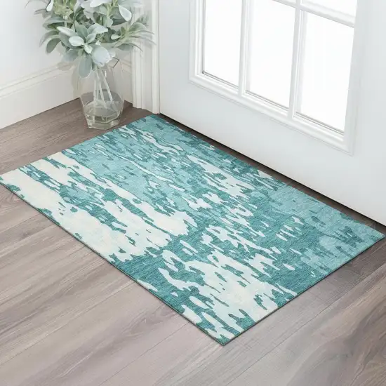 Teal And Ivory Abstract Washable Area Rug With UV Protection Photo 2