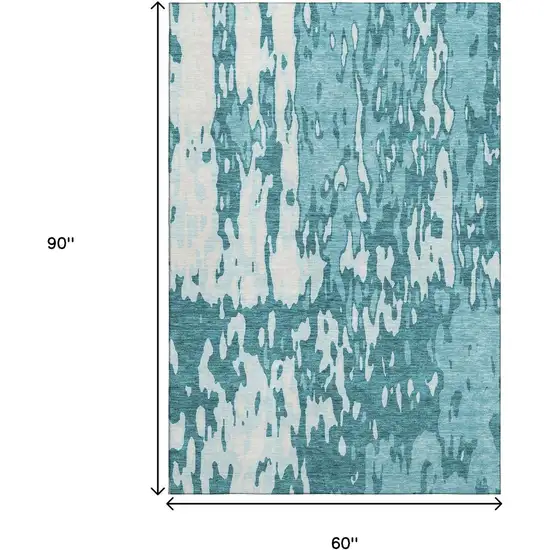 Teal And Ivory Abstract Washable Area Rug With UV Protection Photo 9