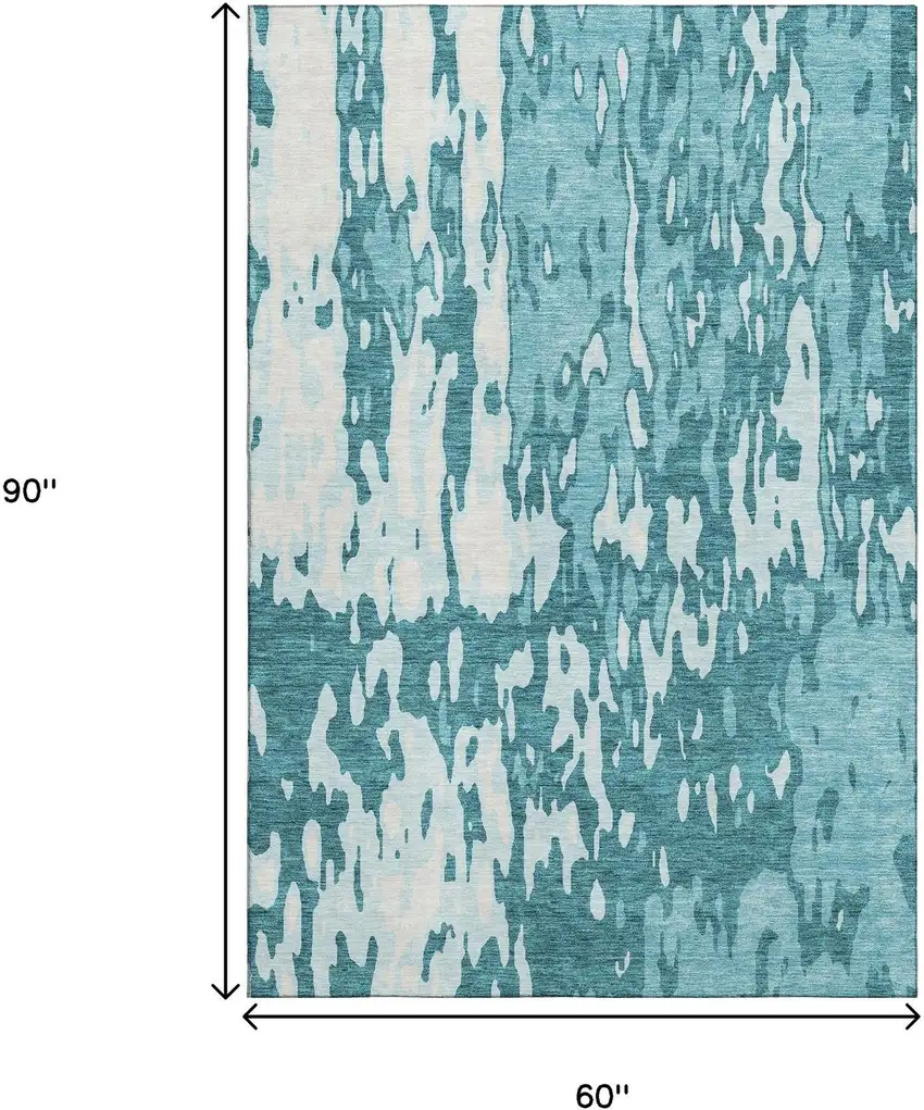 Teal And Ivory Abstract Washable Area Rug With UV Protection Photo 9