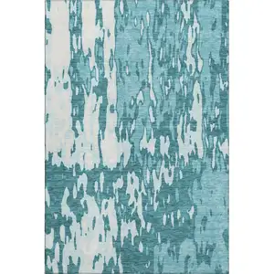 Photo of Teal And Ivory Abstract Washable Area Rug With UV Protection