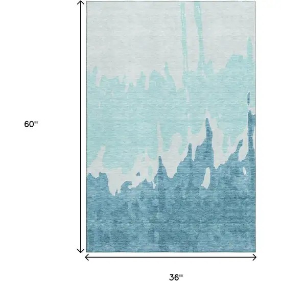 Teal And Ivory Abstract Washable Area Rug With UV Protection Photo 9