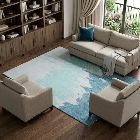 Teal And Ivory Abstract Washable Area Rug With UV Protection Photo 1