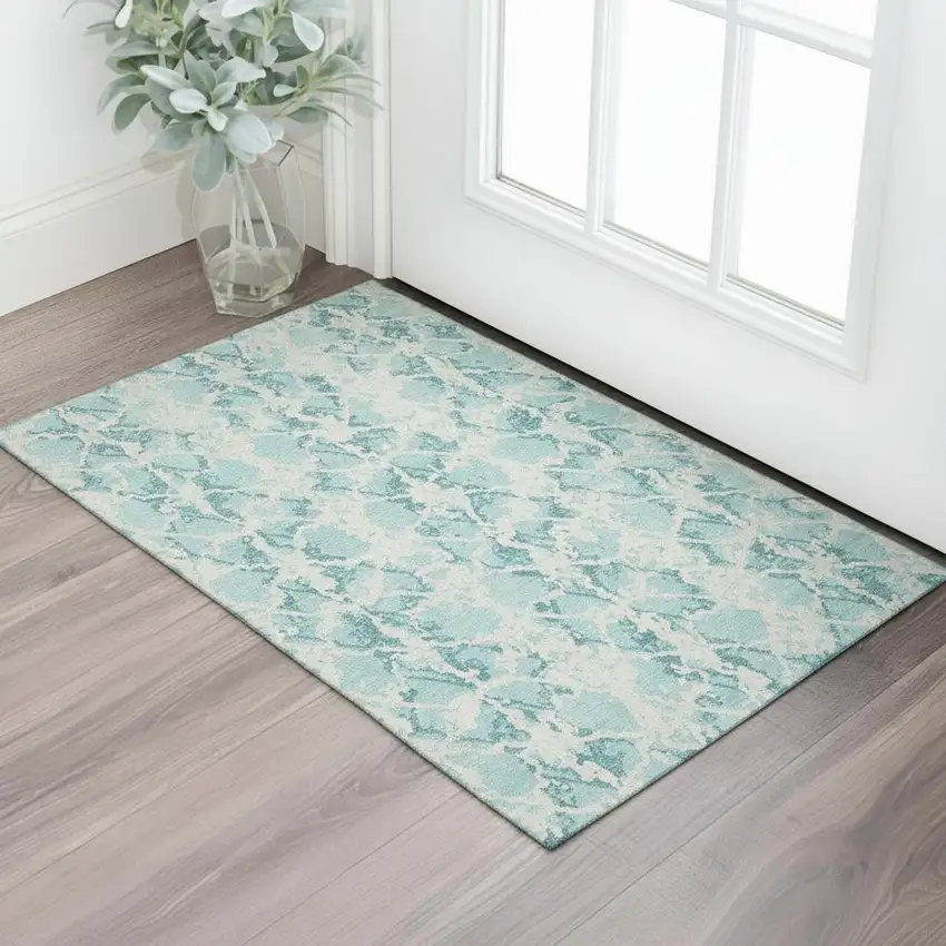 Teal And Ivory Abstract Washable Area Rug With UV Protection Photo 2