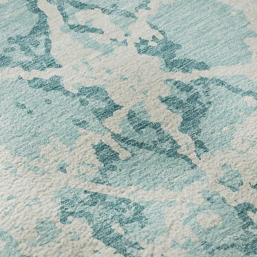 Teal And Ivory Abstract Washable Area Rug With UV Protection Photo 9