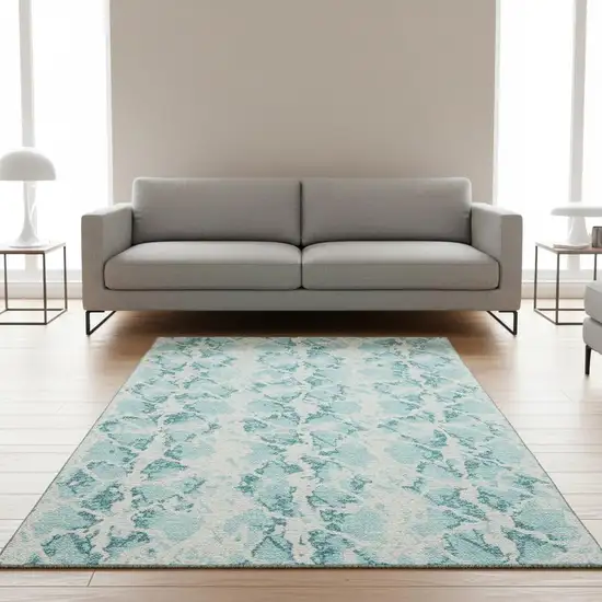 Teal And Ivory Abstract Washable Area Rug With UV Protection Photo 2
