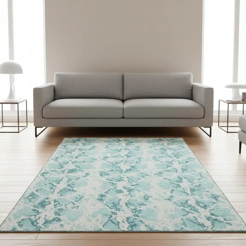 Teal And Ivory Abstract Washable Area Rug With UV Protection Photo 2