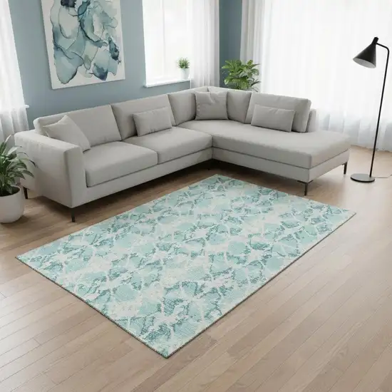 Teal And Ivory Abstract Washable Area Rug With UV Protection Photo 2