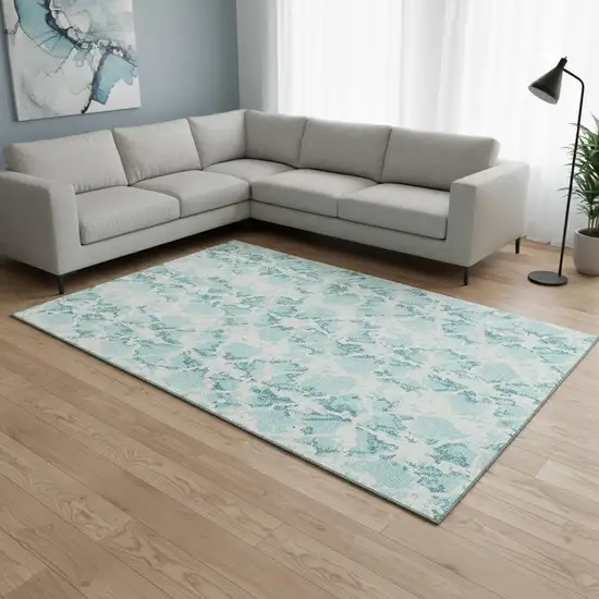 Teal And Ivory Abstract Washable Area Rug With UV Protection Photo 2