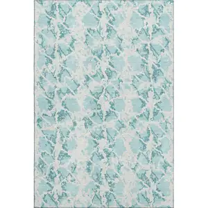 Photo of Teal And Ivory Abstract Washable Area Rug With UV Protection