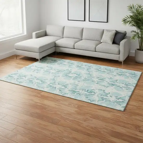 Teal And Ivory Abstract Washable Area Rug With UV Protection Photo 2