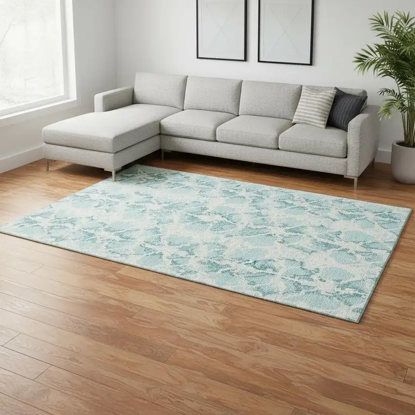 Teal And Ivory Abstract Washable Area Rug With UV Protection Photo 2