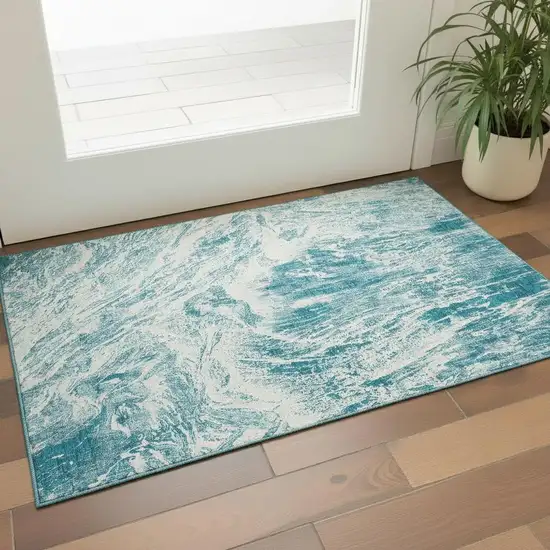 Teal And Ivory Abstract Washable Area Rug With UV Protection Photo 2