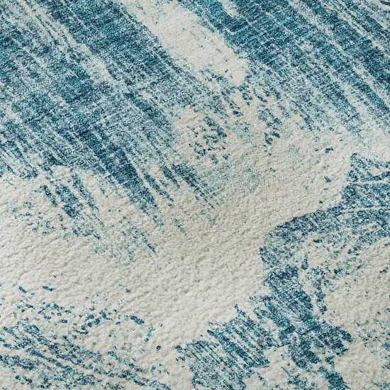 Teal And Ivory Abstract Washable Area Rug With UV Protection Photo 9