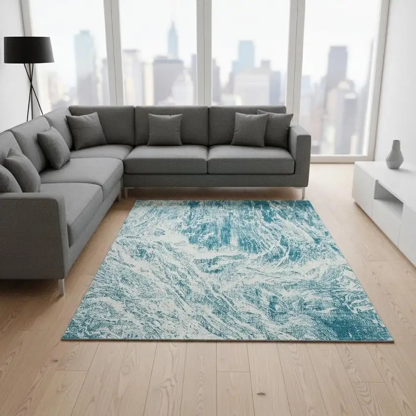 Teal And Ivory Abstract Washable Area Rug With UV Protection Photo 2