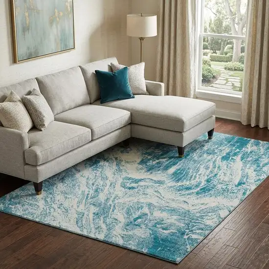 Teal And Ivory Abstract Washable Area Rug With UV Protection Photo 1