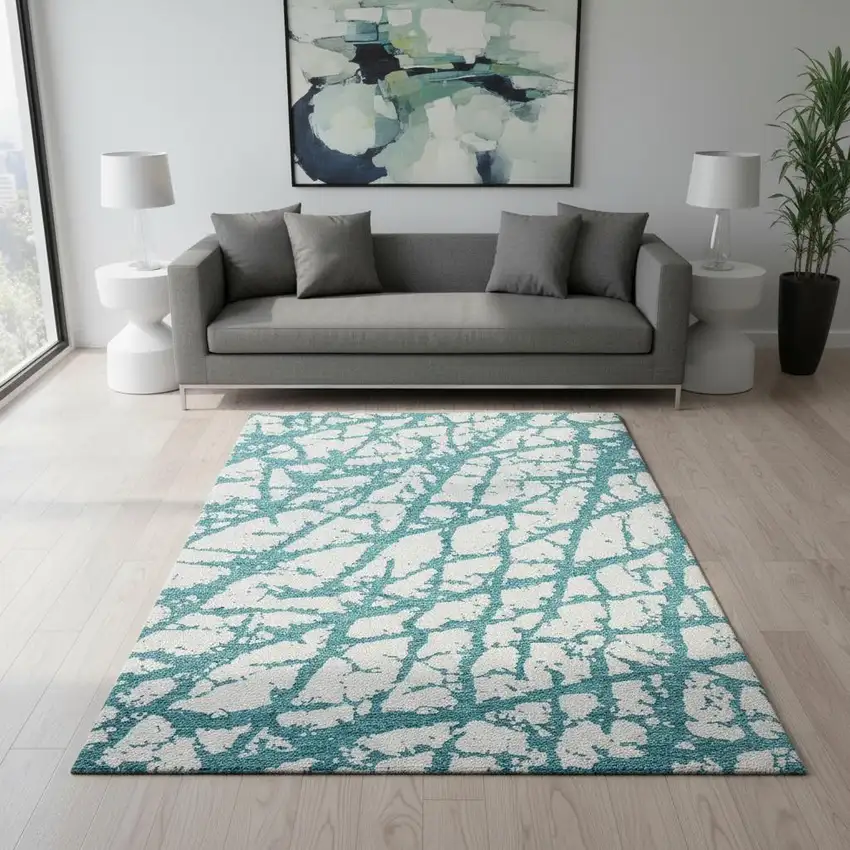 Teal And Ivory Abstract Washable Area Rug With UV Protection Photo 2