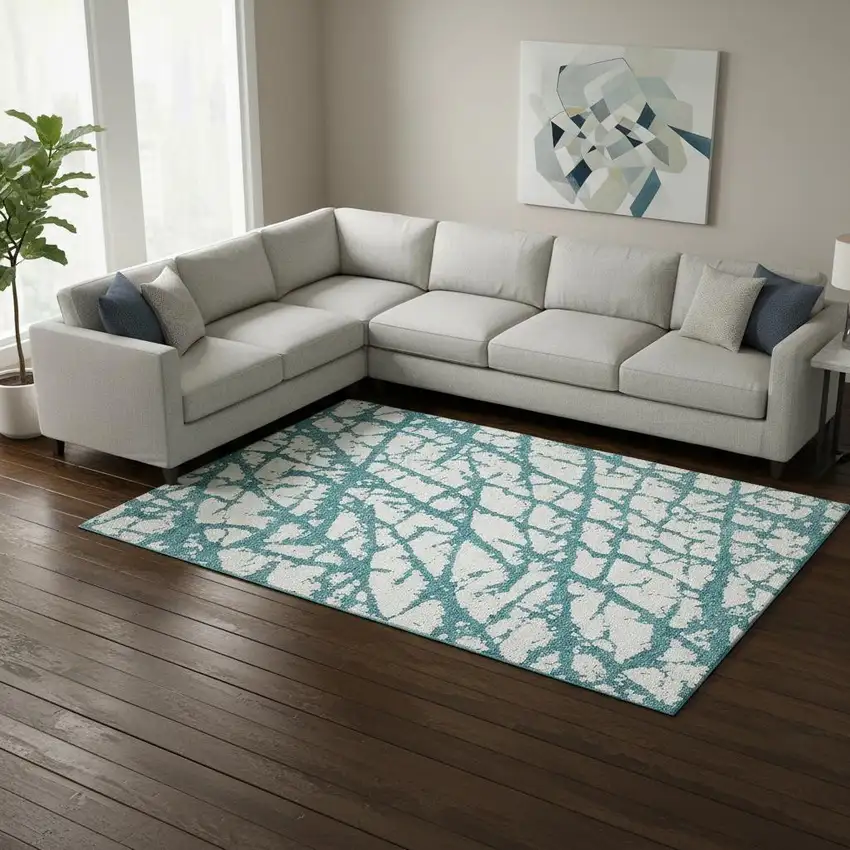 Teal And Ivory Abstract Washable Area Rug With UV Protection Photo 2