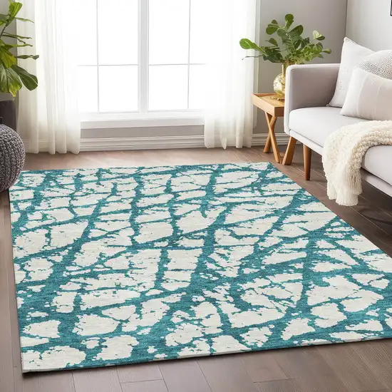 Teal And Ivory Abstract Washable Area Rug With UV Protection Photo 4