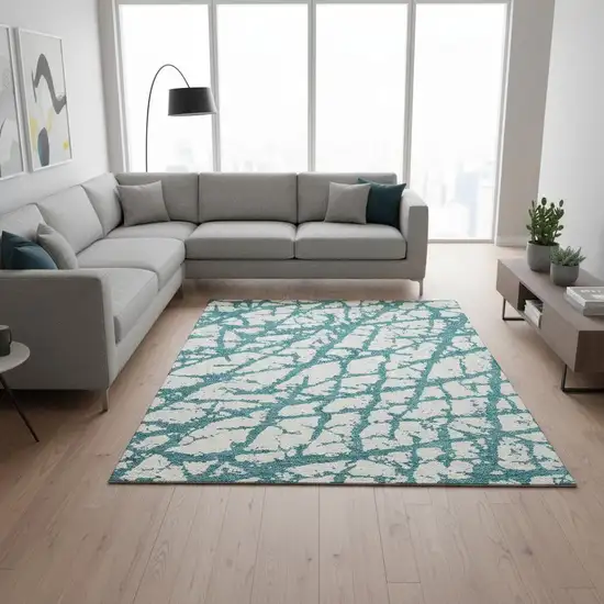 Teal And Ivory Abstract Washable Area Rug With UV Protection Photo 2