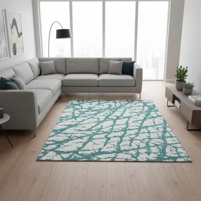 Teal And Ivory Abstract Washable Area Rug With UV Protection Photo 2