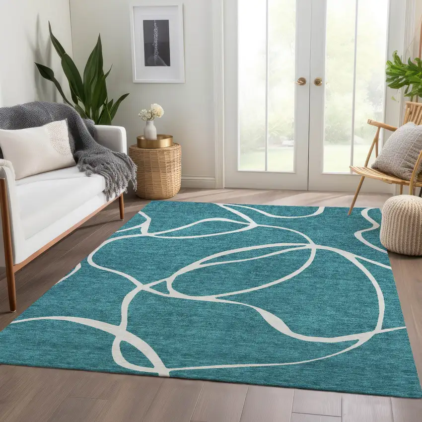 Teal And Ivory Abstract Washable Area Rug With UV Protection Photo 5