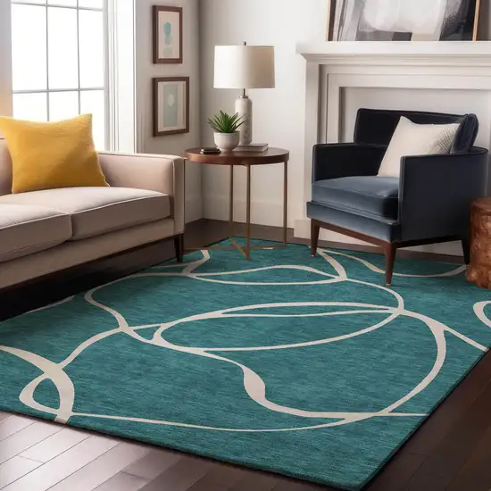 Teal And Ivory Abstract Washable Area Rug With UV Protection Photo 3