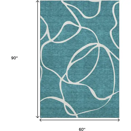 Teal And Ivory Abstract Washable Area Rug With UV Protection Photo 9