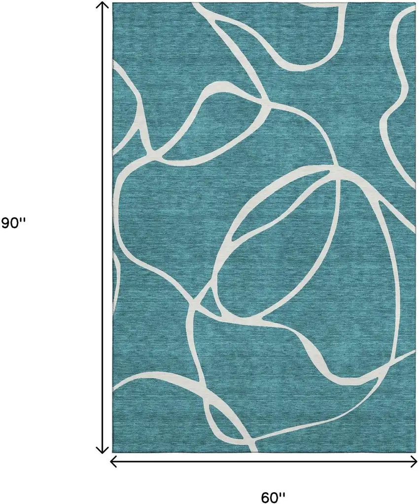 Teal And Ivory Abstract Washable Area Rug With UV Protection Photo 9