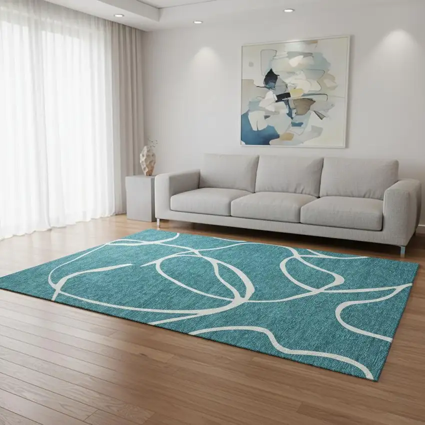 Teal And Ivory Abstract Washable Area Rug With UV Protection Photo 2