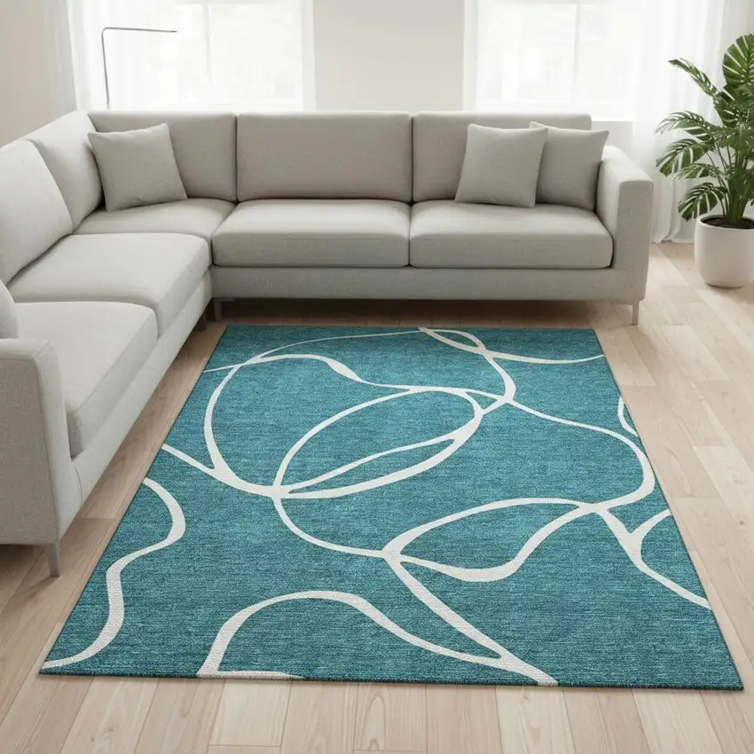 Teal And Ivory Abstract Washable Area Rug With UV Protection Photo 2