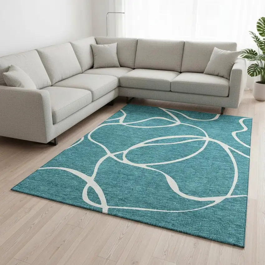 Teal And Ivory Abstract Washable Area Rug With UV Protection Photo 2