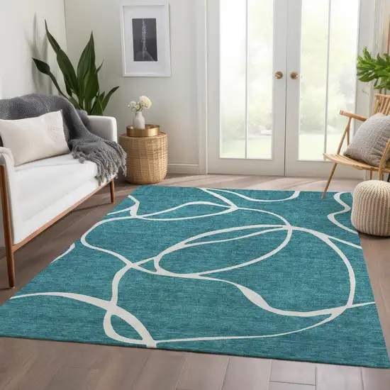 Teal And Ivory Abstract Washable Area Rug With UV Protection Photo 5