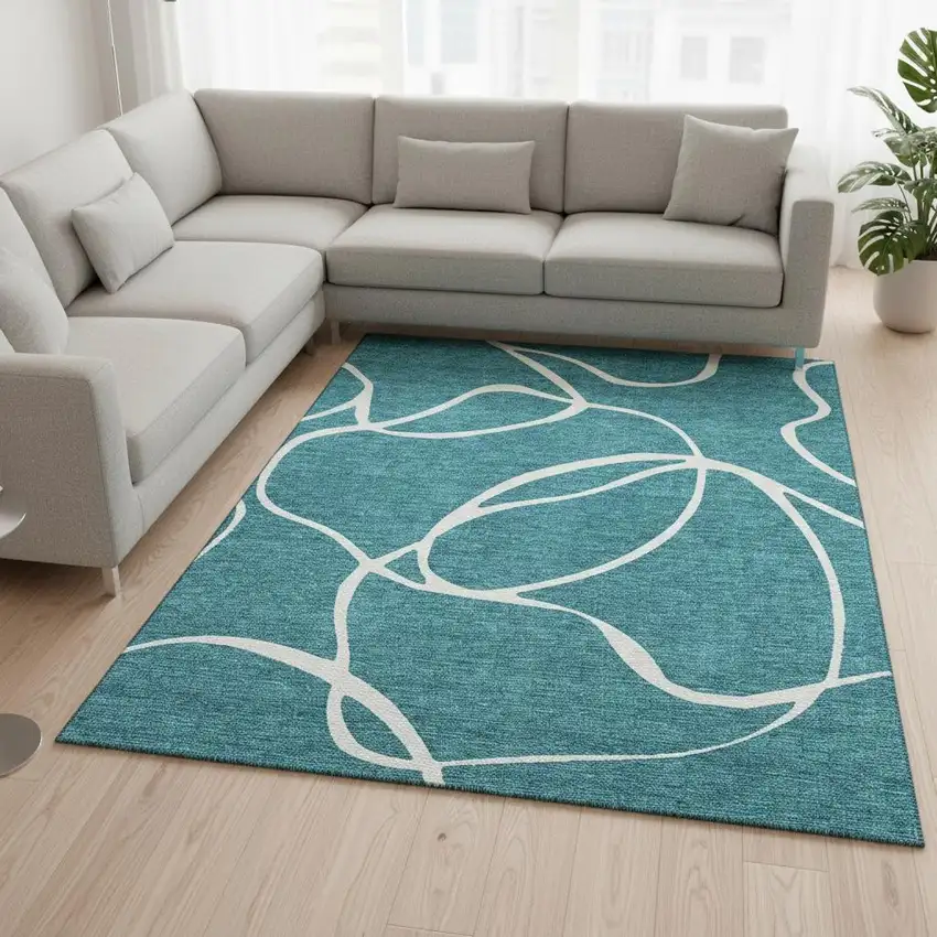 Teal And Ivory Abstract Washable Area Rug With UV Protection Photo 2