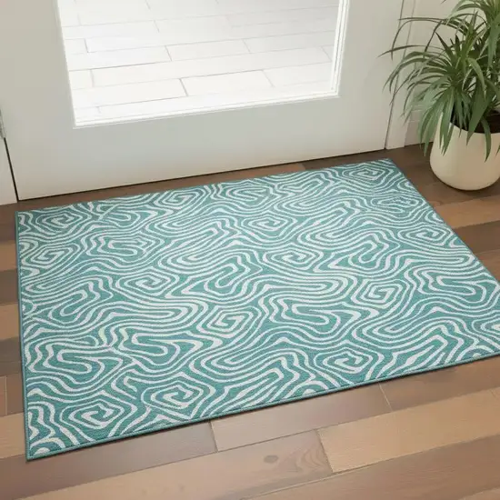 Teal And Ivory Abstract Washable Area Rug With UV Protection Photo 2