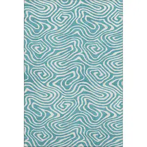 Photo of Teal And Ivory Abstract Washable Area Rug With UV Protection