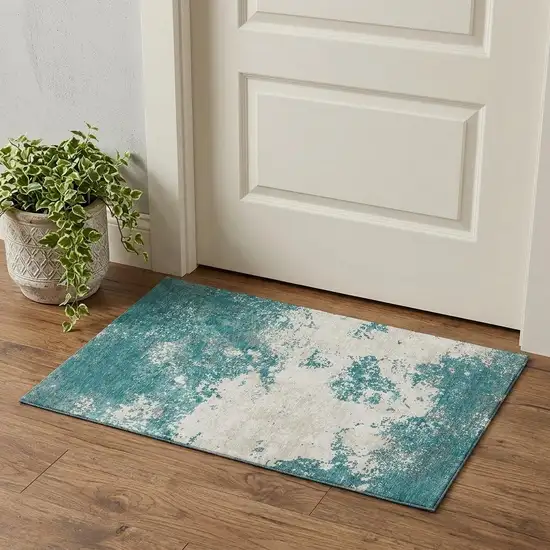 Teal And Ivory Abstract Washable Area Rug With UV Protection Photo 1