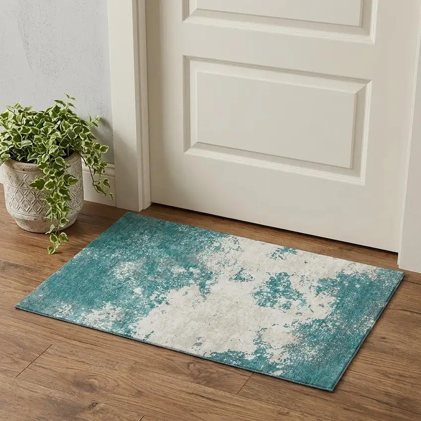 Teal And Ivory Abstract Washable Area Rug With UV Protection Photo 1