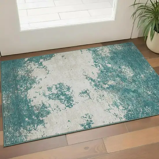 Teal And Ivory Abstract Washable Area Rug With UV Protection Photo 2