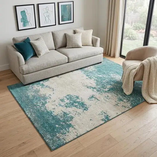 Teal And Ivory Abstract Washable Area Rug With UV Protection Photo 1