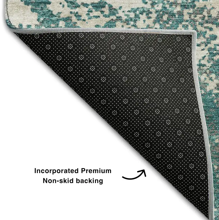 Teal And Ivory Abstract Washable Area Rug With UV Protection Photo 6
