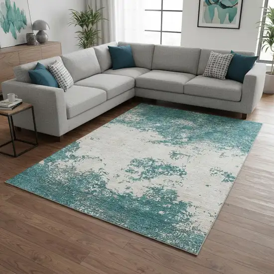 Teal And Ivory Abstract Washable Area Rug With UV Protection Photo 2