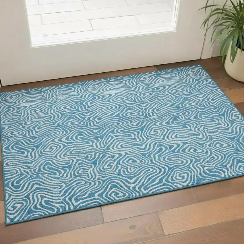 Teal And Ivory Abstract Washable Area Rug With UV Protection Photo 2