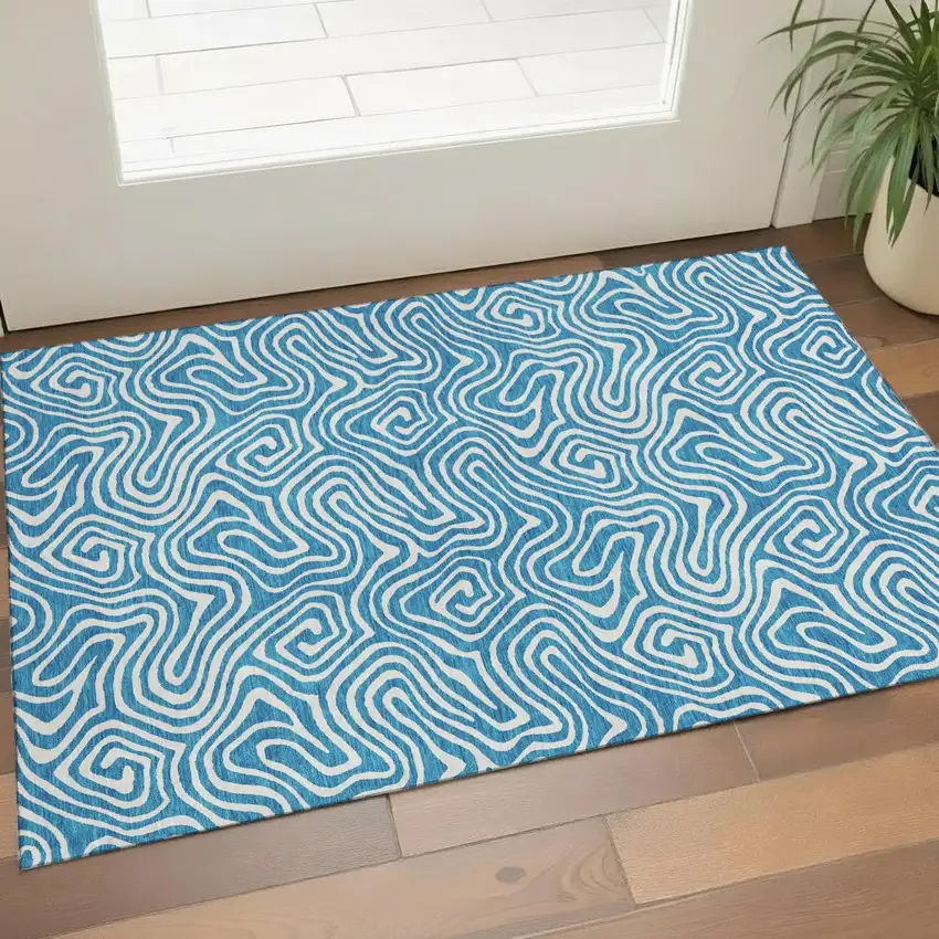 Teal And Ivory Abstract Washable Area Rug With UV Protection Photo 1