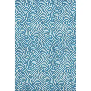 Photo of Teal And Ivory Abstract Washable Area Rug With UV Protection